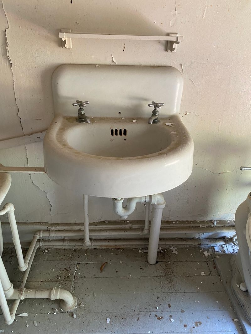 Rounded wall-mounted Sink from renovation of Historic Officer's Home on Governors Island