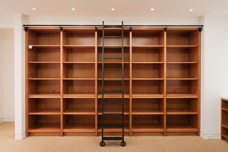 Large Wooden Shelving Unit with Metal Ladder