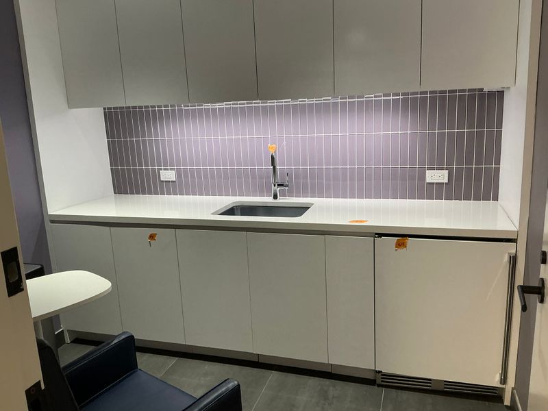 Sink and cabinets with mini fridge